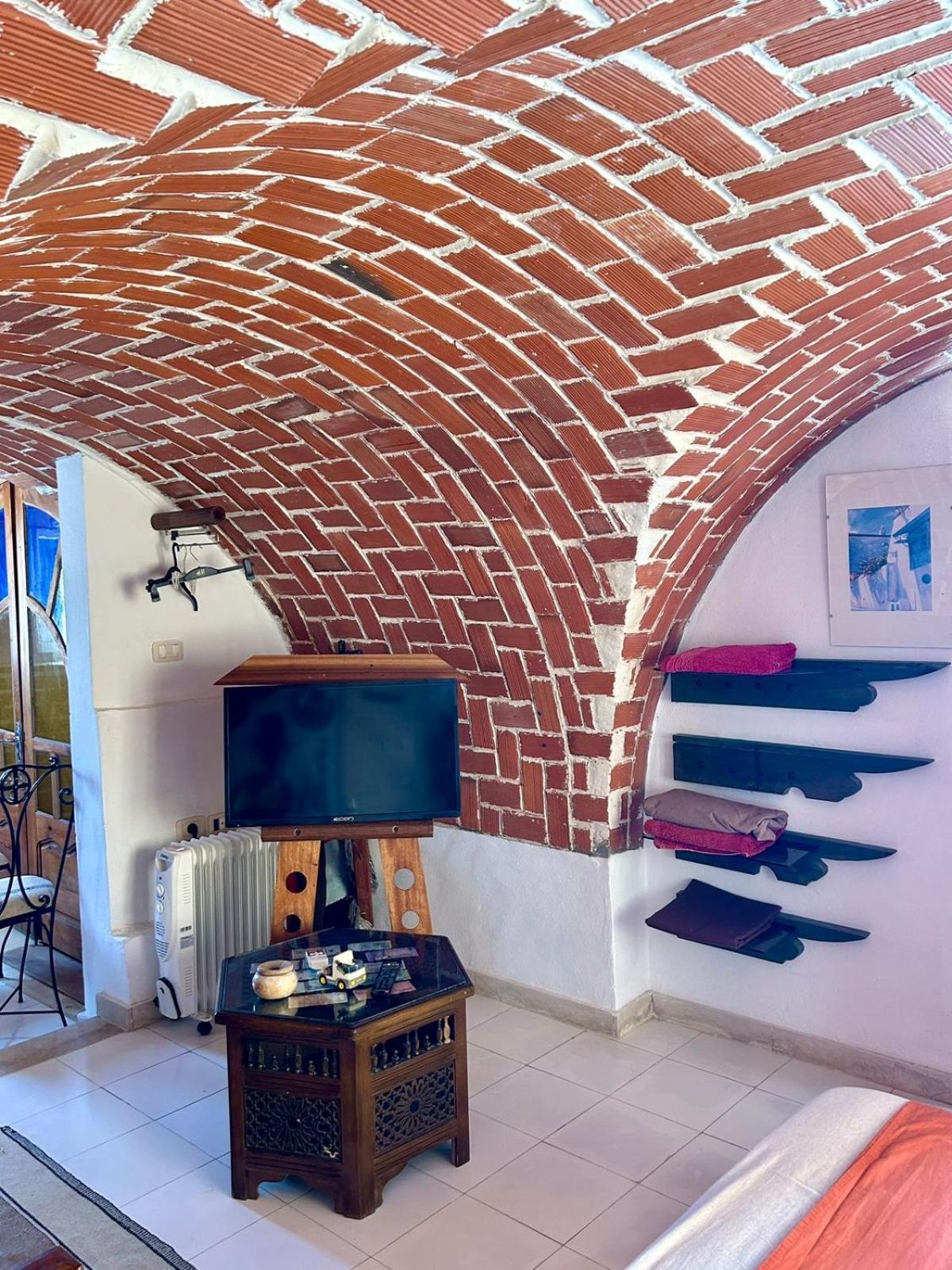 L'Artisan Hotell Harqalah Exteriör bild